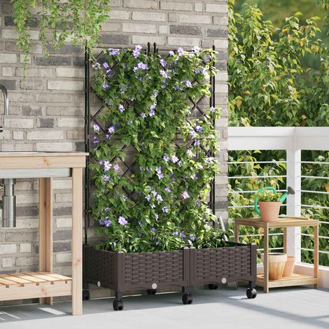 vidaXL Jardinera con enrejado y ruedas 2 uds. Marrón PP (1/5)