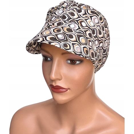 Turbante Tess con visiera 368, protezione solare anche dopo la chemioterapia (1/5)