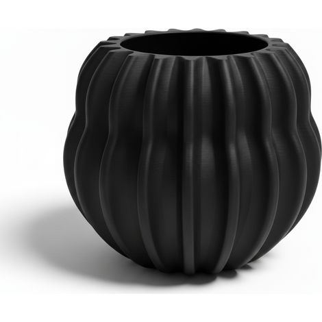 Vaso da fiori moderno nero a forma di barile.