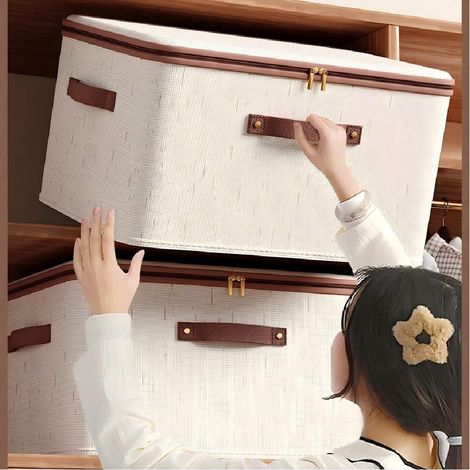 Contenitore portaoggetti impilabile in tessuto con coperchio da 56 litri, maniglie pieghevoli, in poliestere bianco, dimensioni 49x37x31 cm.