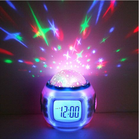 Réveil avec projecteur de ciel étoilé, veilleuse et musique pour enfants. (1/5)