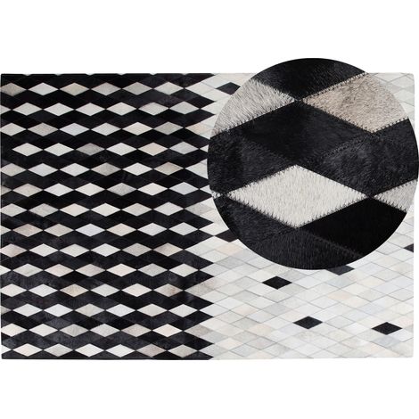 Alfombra de piel blanca y negra 160 x 230 cm moderna patchwork hecha a mano Maldan