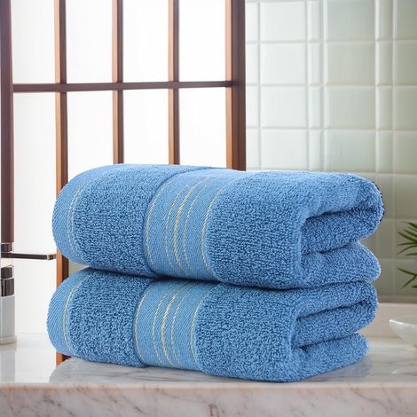 Deux serviettes ultra-douces en pur coton, au design élégant et moderne, à séchage rapide et absorbantes, idéales pour la maison et la cuisine.