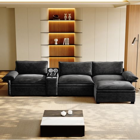 Divano angolare modulare 4 posti in chenille nera 315x70x85 cm con pouf, ricarica wireless, speaker Bluetooth e contenitore (1/5)