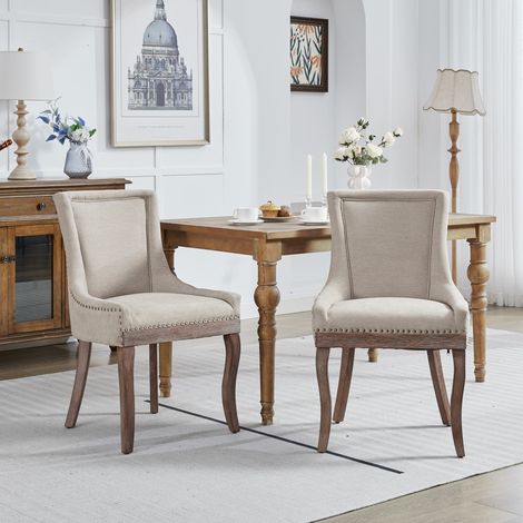 Set di 2 Sedie da Pranzo - Poltroncina Imbottita in Tessuto - Gambe in Legno Massello con Borchie - Design Alto Schienale - Beige (1/5)