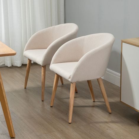 Set aus 2 Esszimmer-/Küchenstühlen im skandinavischen Design – konisch zulaufende, schräge Beine aus Holz und Gummi – ergonomische Sitzfläche, Rückenlehne und Armlehnen in beiger Leinenoptik