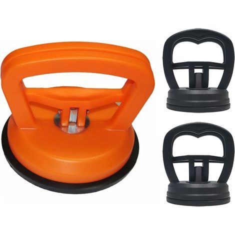 Lot de 3 ventouses de débosselage pour vitres et carrelages de voiture : 1 orange (grande taille) et 2 noires (petite taille). (1/5)