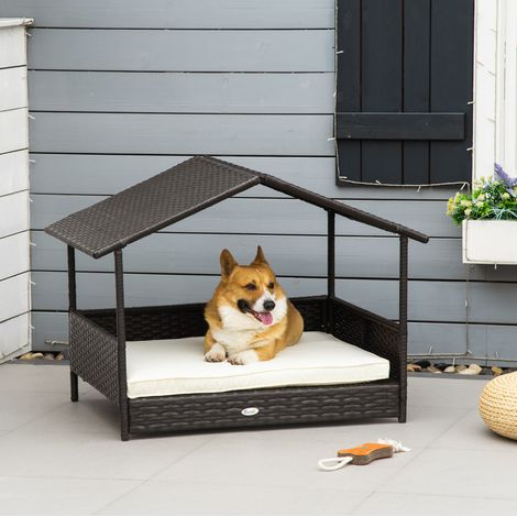 Caseta para perros de ratán con cojín 98 x 69 x 70 cm marrón (1/5)