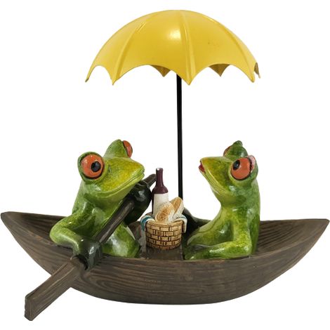 Froschfigur auf einem Boot unter einem Regenschirm (1/5)