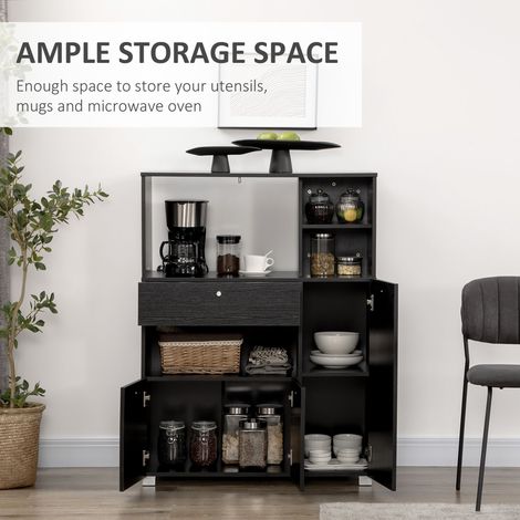 Meuble de rangement compact noir à tiroir avec support pour micro-ondes et étagère, idéal pour l'organisation de la cuisine. (1/5)