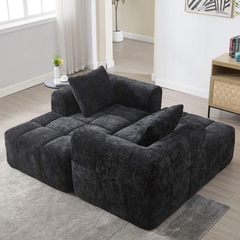 Chaiselongue confortable noir, sans montage, avec coussin et poches
latérales (1/5)