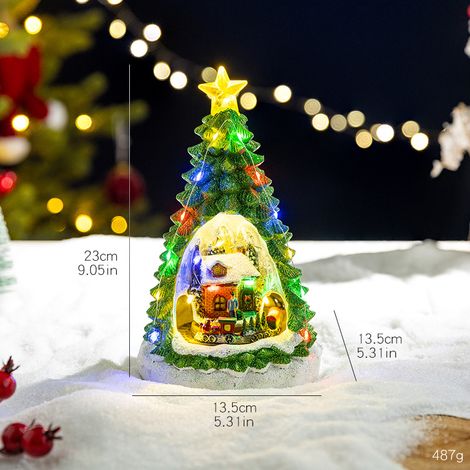 Boîte à musique en forme de sapin de Noël avec un train lumineux et rotatif joue 8 mélodies piles non incluses. (1/4)
