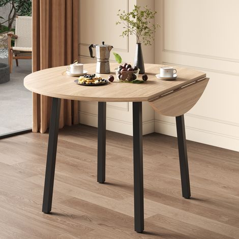 Tavolo da pranzo pieghevole rotondo 100x100 cm colore rovere in MDF con piano salvaspazio (1/5)