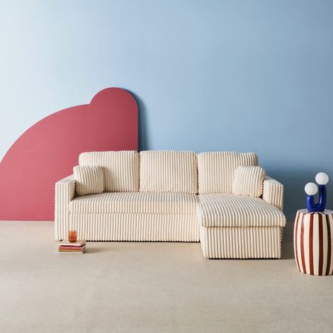 Sweeek – Canapé d'angle réversible convertible en tissu effet fourrure blanc crème – Coffre de rangement – Dimensions 219x147cm – Couchage 120x190cm (1/5)