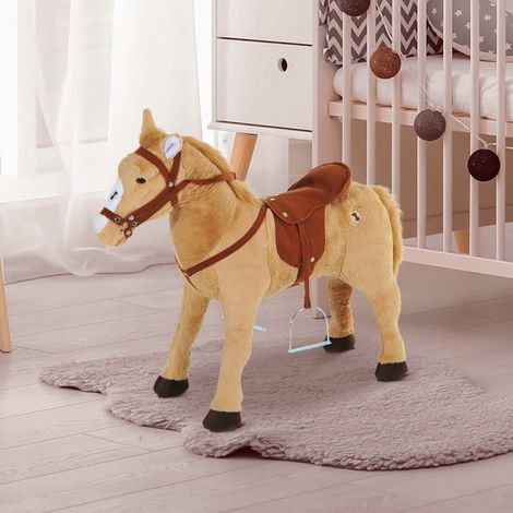 Cheval à bascule sur roulettes, 60 cm, avec selle, bride, étriers et effets sonores. Jouet pour monter et s'asseoir. Convient aux enfants dès 2 ans. Cheval à bascule en peluche beige. Utilisation inté