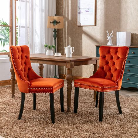 Ensemble de 2 chaises de salle à manger Nikki Collection modernes et haut de gamme, capitonnées, en bois massif, revêtues de velours, avec pieds en bois et garniture cloutée, orange, DE2001OG