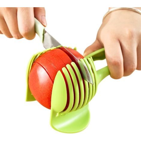 Manueller Gemüseschneider mit Führungsschienen. Schneidet Tomaten, Zwiebeln und anderes Gemüse in perfekte Scheiben. Sicheres Gerät mit rutschfestem Griff. Einfache Handhabung und Reinigung. (1/5)