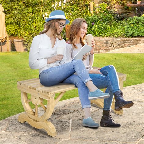 Banc de jardin deux places en bois avec structure à lattes et pieds en forme de roue de chariot. Dimensions : 98 x 50 x 39,5 cm. Couleur bois. (1/5)