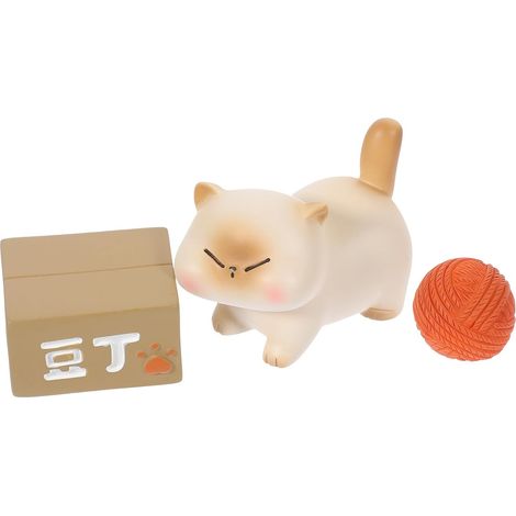 Kleiner Katzenfigur als kreative Tischdekoration mit