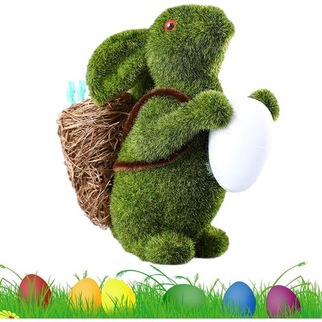 Dekoration bunt hält EIN Ei niedlicher beflockter Osterhase