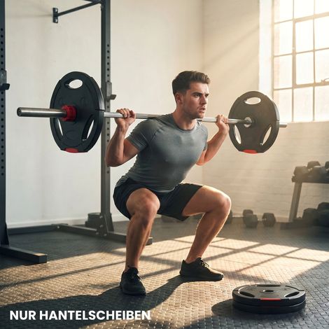 Ensemble de 4 disques de musculation pour l'entraînement, la salle de sport, les séances à domicile et le renforcement musculaire : 2 disques de 5 kg et 2 disques de 2,5 kg, noirs. (1/5)