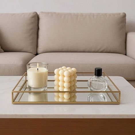 Étagère en verre doré avec miroir, élégante pour parfums et bijoux, idéale pour un bureau ou une table basse.