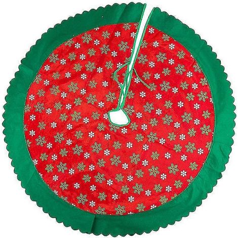 La jupe de sapin sur le thème de Noël arbore une palette de couleurs rouge et verte classique, créant une ambiance festive. (1/5)