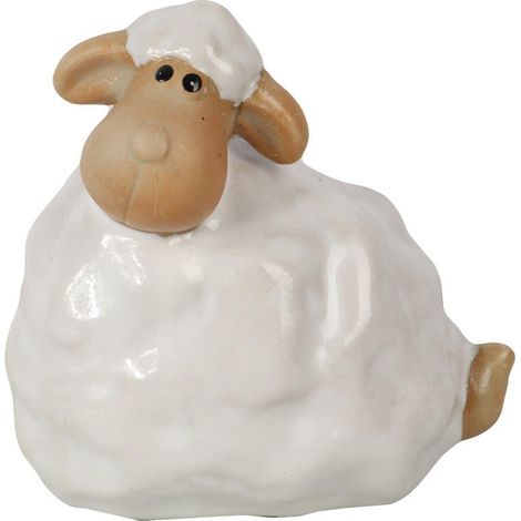 Elegante statuetta in ceramica a forma di agnello pasquale, nei colori bianco e crema. (1/3)