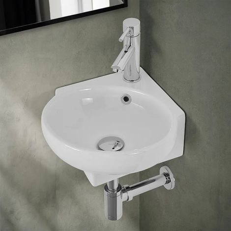 Lavabo sospeso ad angolo 39x36 in ceramica lucida con design ovale (1/5)
