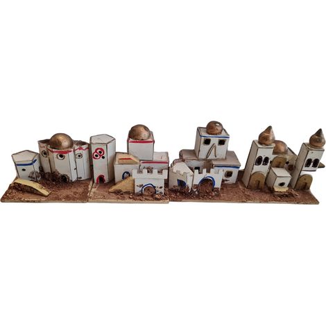 Scenario con casette e capanne bianche per paesaggio da presepe natalizio