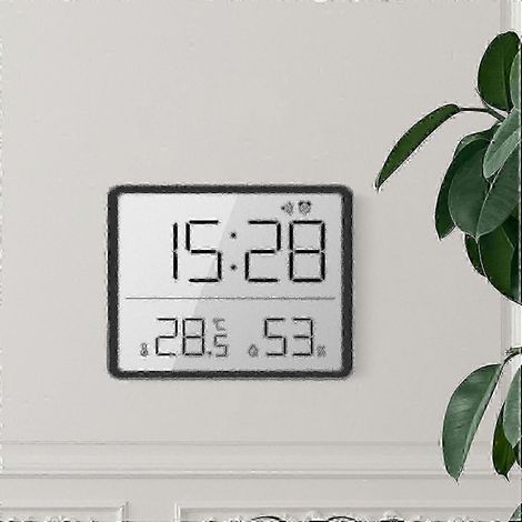 Horloge LCD magnétique à suspendre, design ultra-mince, fixation murale. (1/5)
