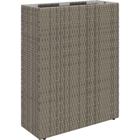 Le grand pot de fleurs mesure 55 x 22 x 70 cm.