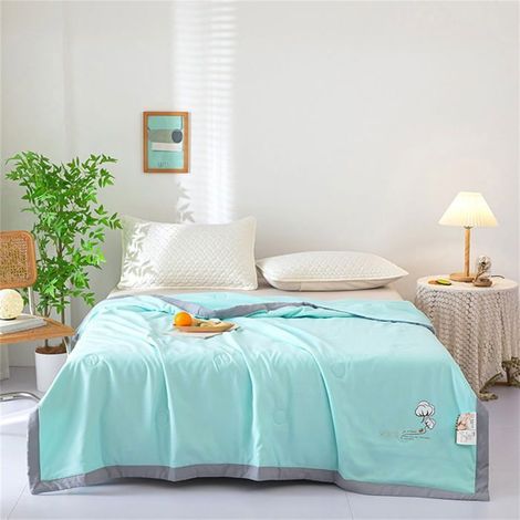 Couette d'été FENGYIKEJI en soja - Couette rafraîchissante, format simple, respirante et légère pour les personnes qui ont chaud (1/4)