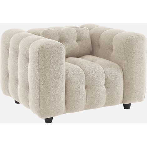 Sillón tapizado en tejido borreguito