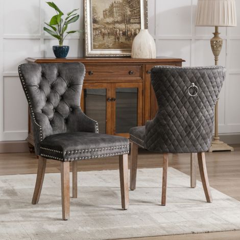 Chaises de salle à manger (Lot de 2) — Chaises rembourrées avec anneaux décoratifs au dossier, finitions cloutées, pieds en bois massif et revêtement en velours — Gris (1/4)