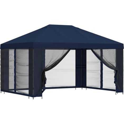 Le chalet de jardin a des murs de 4 x 3 mètres et est fait de fibre de polyester bleue et d'acier. (1/5)