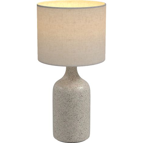 Lampe de table vintage avec pied en céramique, coloris sable et beige. (1/5)