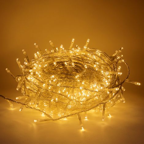 Luccika Home stringa catena 5 mt serie da 100 luci per albero di Natale a led bianco caldo 31V cavo trasparente con 8 giochi di luce e memoria IP44 per uso esterno interno Bianco Caldo 5 metri - 100 l