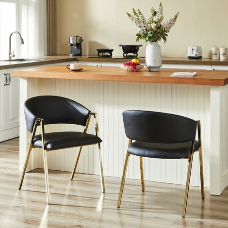 Silla de comedor 112x59x77 cm de polipiel PU negra, moderna para salón FLORAGRACE (1/5)