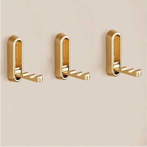 Drei dekorative goldene Wandhaken, dekorativ und doch unauffällig. (1/4)