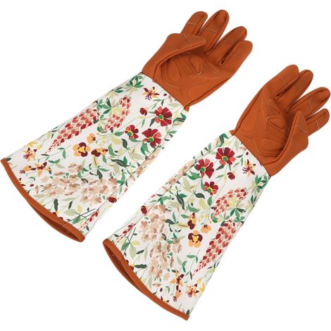 Ein Paar langärmelige Gartenhandschuhe zum Schutz der Hände beim Schneiden und Trimmen im Garten. (1/5)