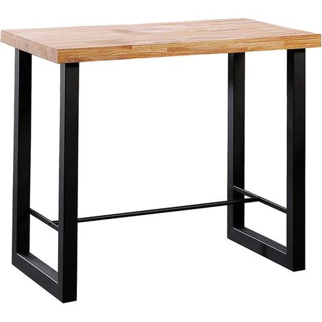 Home Heavenly® - Mesa alta industrial DAREK, mesa alta de madera y patas metálicas en ‘U’, con reposapiés. Medida: 120x70 cm Color: Roble Nordish - Negro (1/5)