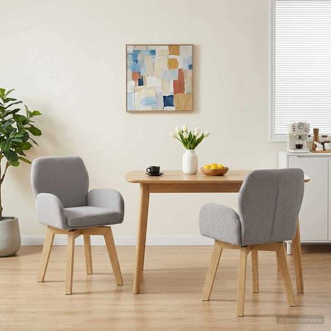 vidaXL Sillas de comedor giratorias 2 uds. Bouclé Gris Claro (1/5)