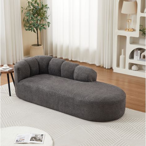 Chaise longue moderna de chenilla gris antracita, con respaldo ondulado y sin brazos (1/5)
