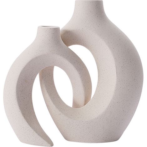 A set of white ceramic vases, perfect for displaying reeds and dried flowers—a modern desktop decoration. (1/5)