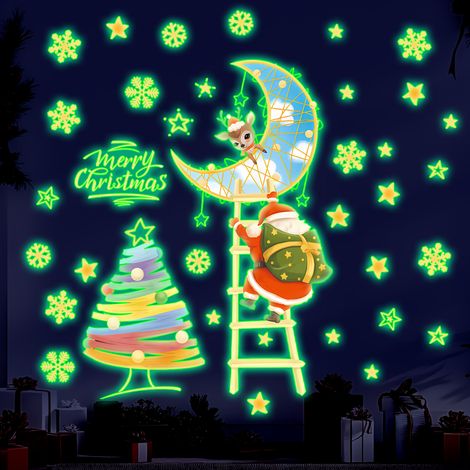 Adesivi natalizi con elementi fosforescenti, raffiguranti Babbo Natale, alberi di Natale, stelle, lune e altre decorazioni festive. (1/5)