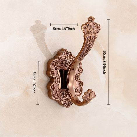 Crochets trois pièces en forme de couronne en or rose avec finition antique, livrés avec vis de fixation. Crochets muraux polyvalents adaptés pour suspendre des serviettes, des clés, des sacs, des cha (1/5)