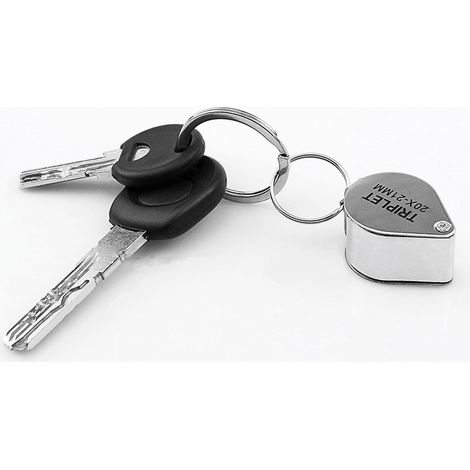 Loupe de bijoutier argentée, grossissement 30x, avec étui de poche pliable. (1/4)