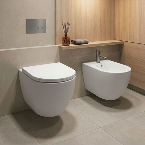 Sanitari sospesi in ceramica bianco design ovale con copriwc e scarico rimless Velora (1/5)