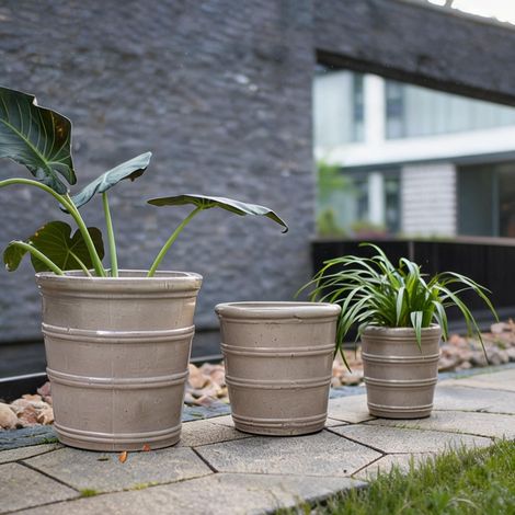 Set de 3 pots de fleurs en céramique avec finition dorée (1/5)